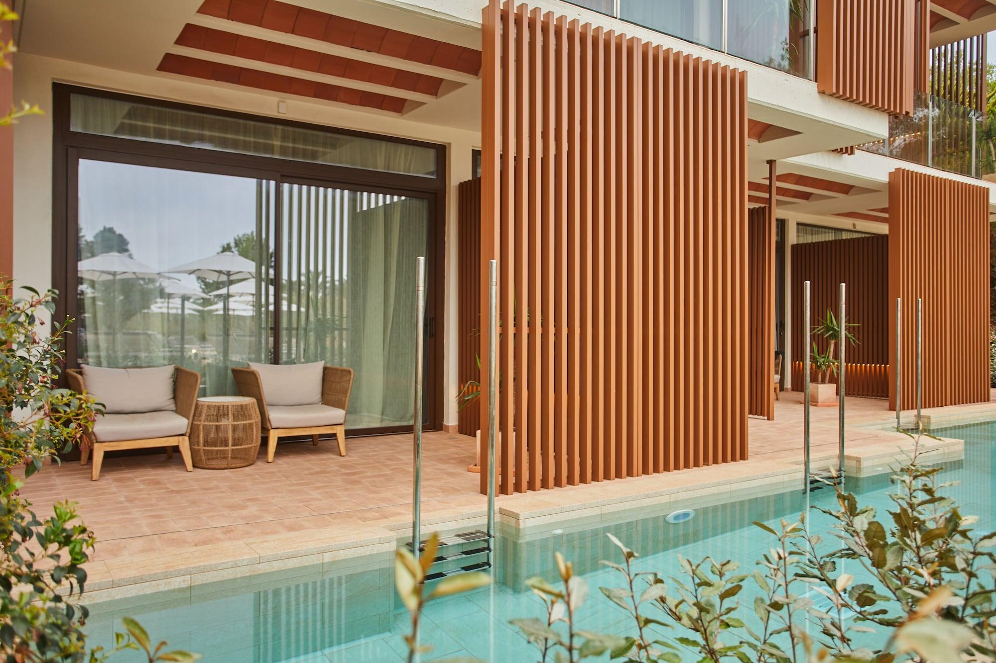 Port de Sant Miguel Cala San Miguel Ibiza Resort, Adults Only, Curio Collection By Hilton מראה חיצוני תמונה A private pool at the hotel